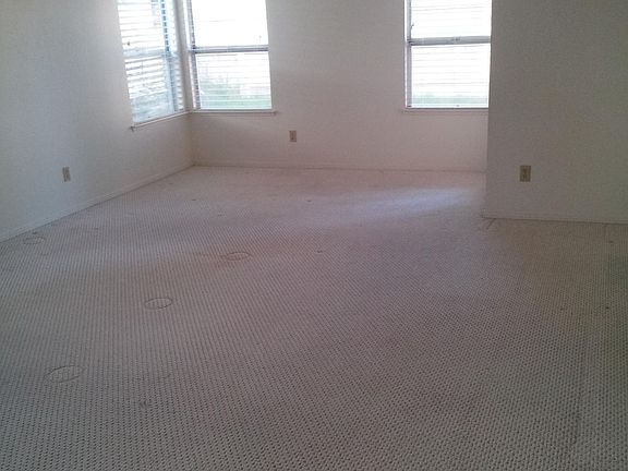 Master bedroom New paint and carpet after photo was taken