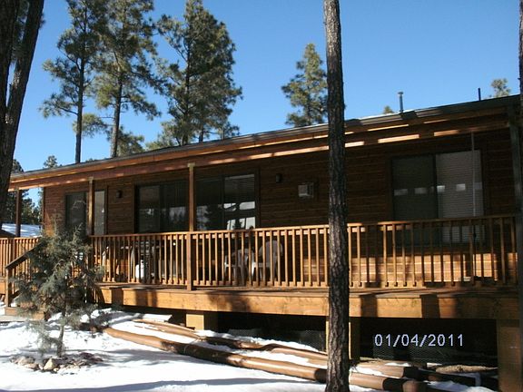 Covered deck on back of home