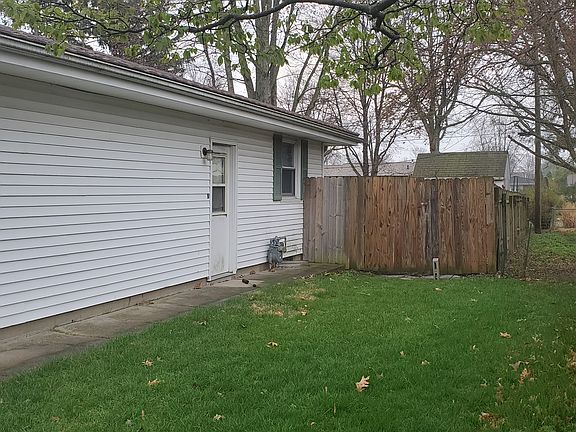 Front side, side garage door and office window, back yard privacy fence with gate.