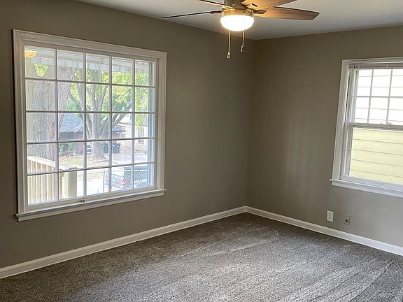 spacious living room with big picture window
