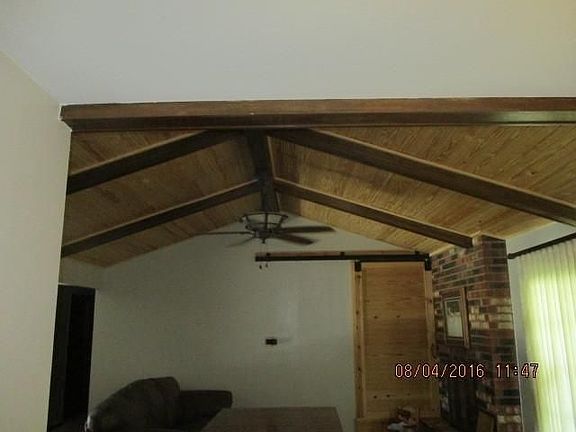 vaulted ceiling with beams