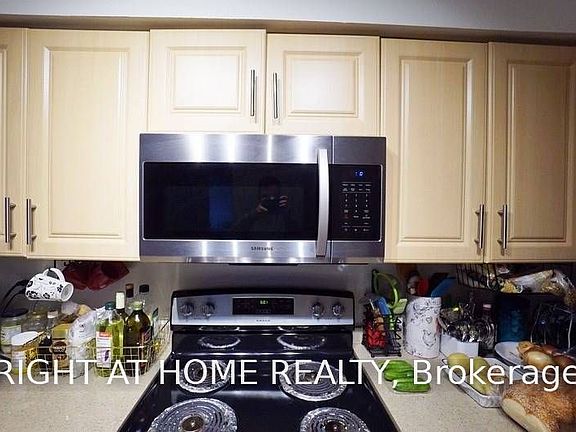 3rd image of 30 Harrison Garden Blvd Unit 207