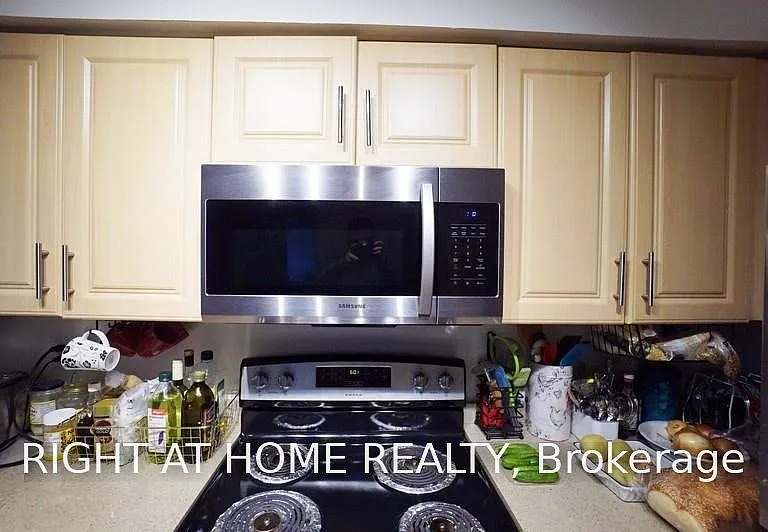 30 Harrison Garden Blvd #207 — Photo 3