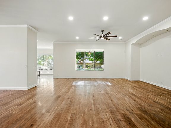 Entry to living room with formal dining room on the left.