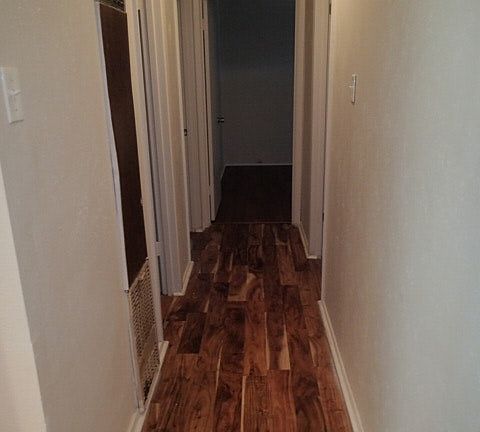 Hallway that leads to 3 bedrooms and one bathroom