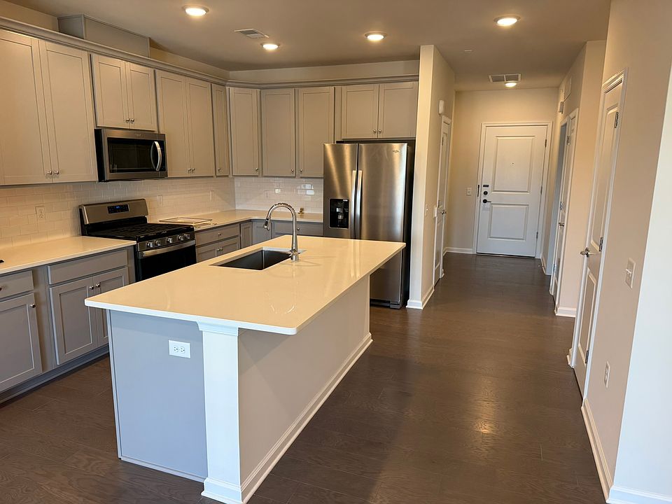 Kitchen and hallway up to front entrance