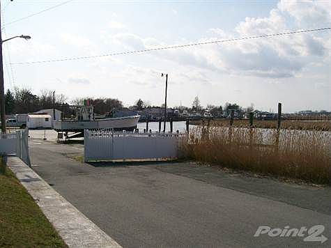 Gated Entrance and View of Marina