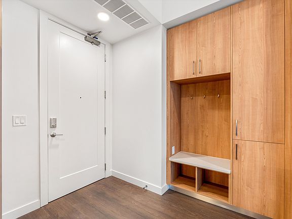 Mudroom drop at entry and plentiful pantry space.