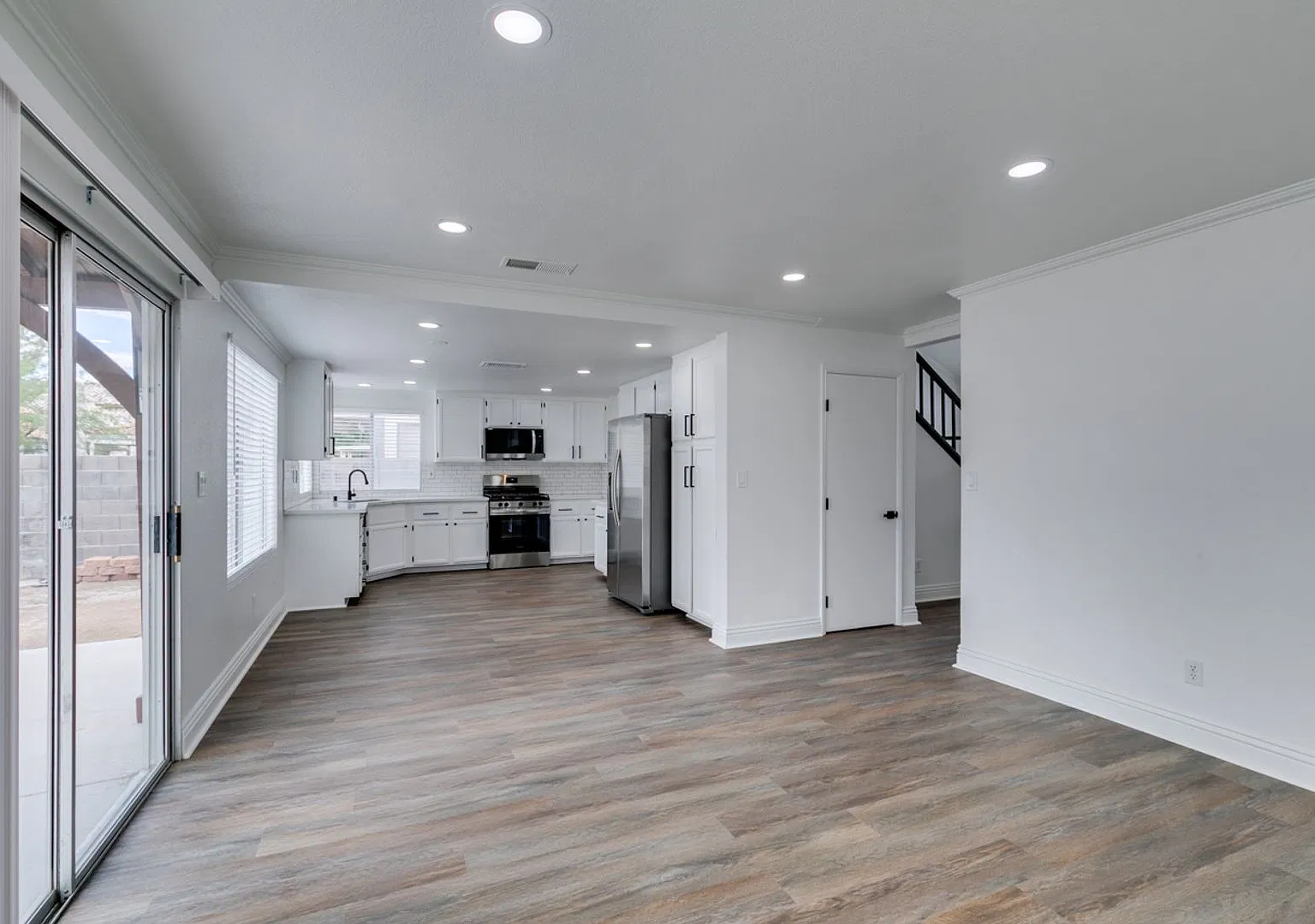 Updated 4-Bedroom Home with Spacious Backyard! — Photo 4