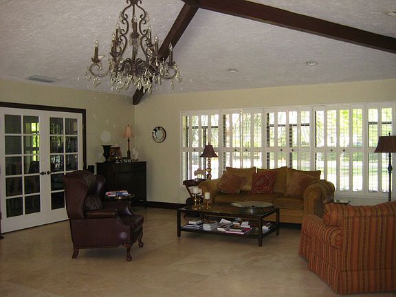 Family living area with pool views