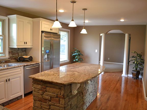Granite C-Tops and island, Hardwoods, Stainless Appliances.