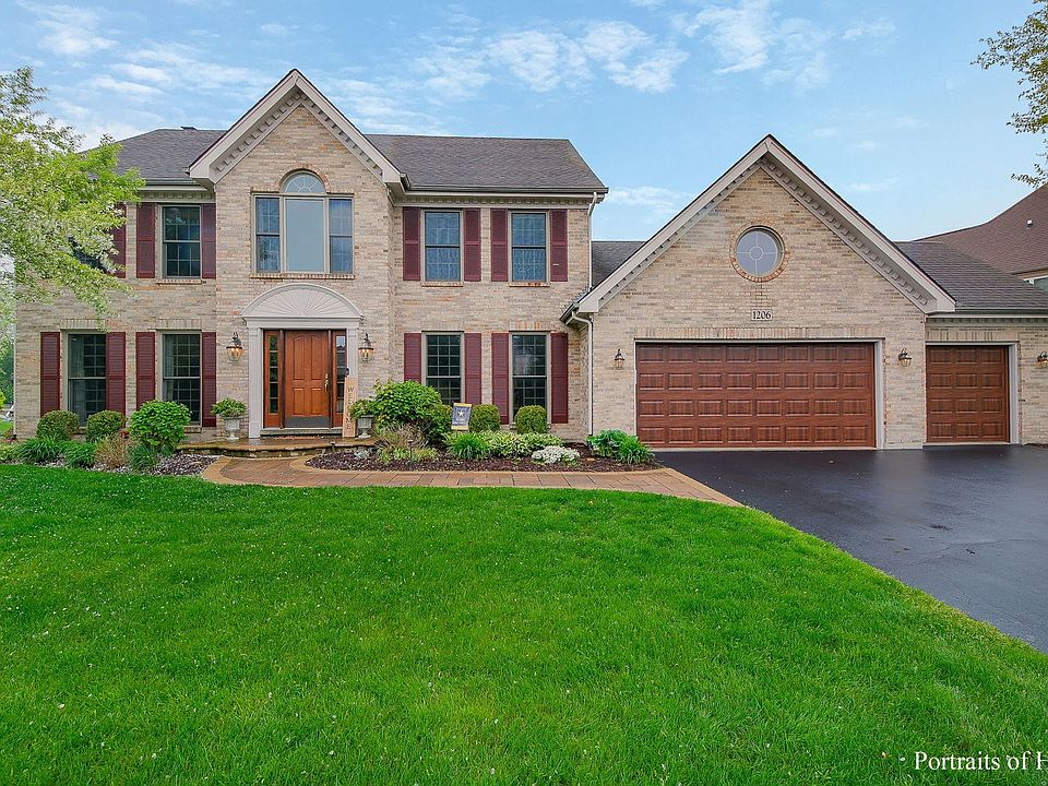 Brick and Cedar Exterior in desirable Hunt Club