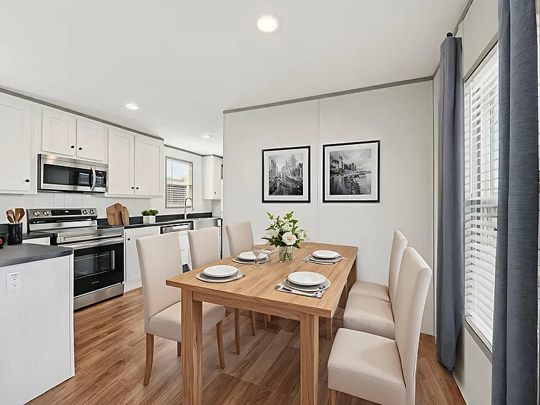Bright dining area just off the kitchen, perfect for everyday meals and easy entertaining.