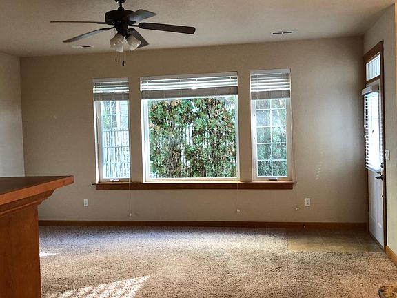 Comfortable living room off dining room.
