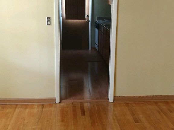 dining room looking through kitchen to side door