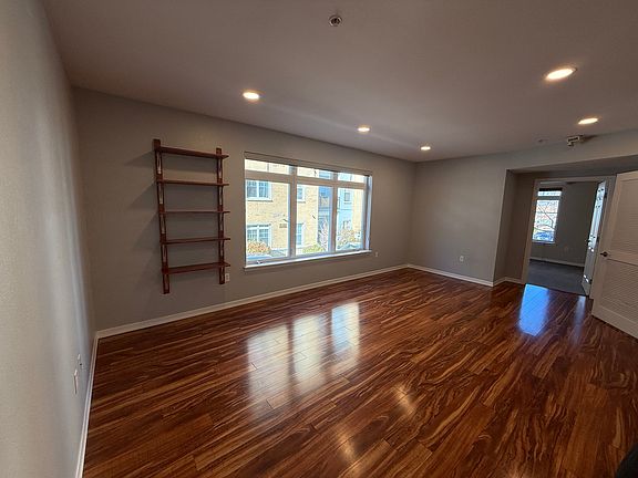 Living/dining room with built-in shelves
