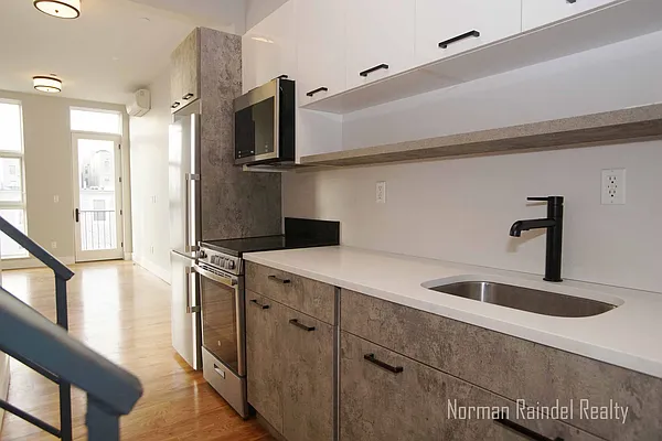 Rented by Norman Raindel, LREB | media 4