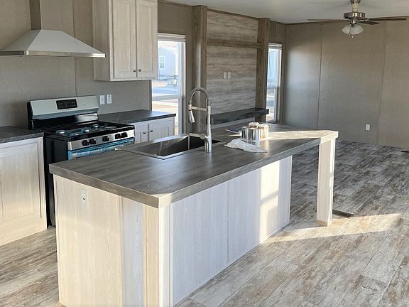 Large Kitchen Island with Stainless Farm Sink