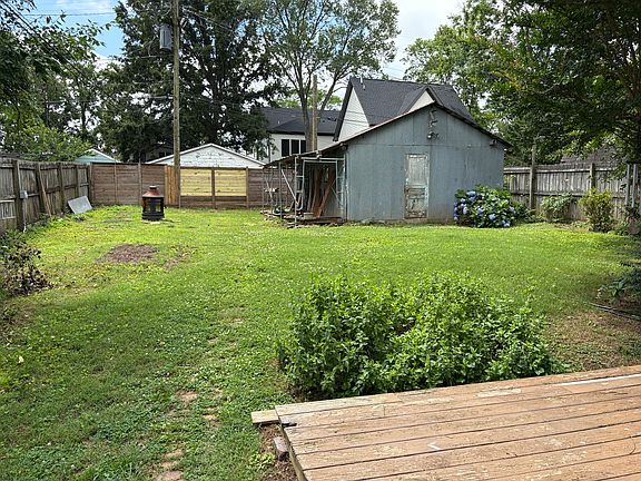 fully fenced backyard, deck outside back door, detached garage
