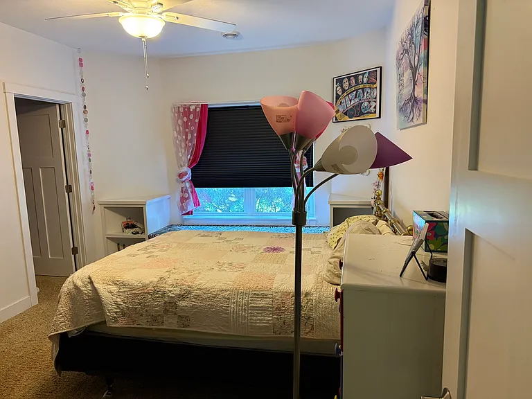 Downstairs bedroom with attached full bath