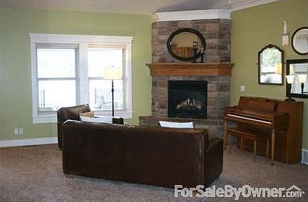 Living
						:
						Large living room with vaulted ceilings. Gas fireplace with custom surround.