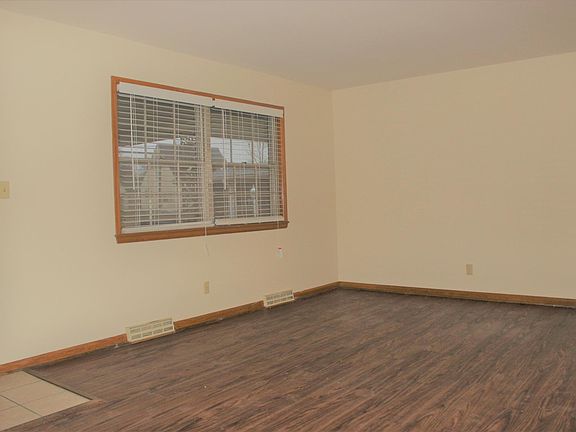Living area with hardwood floor