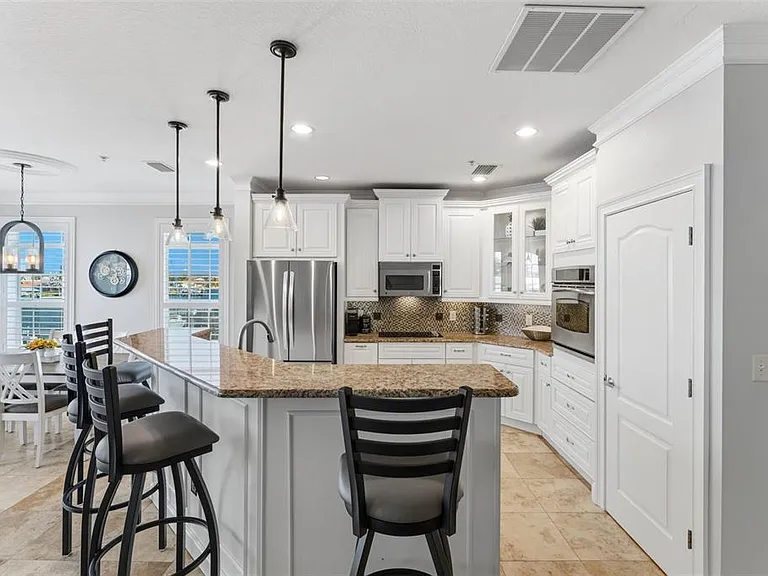 6420 Sunset Bay Cir — Photo 20