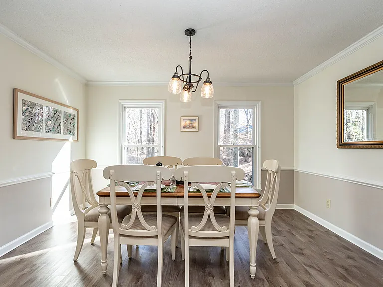 While this dining table is set with a more formal bone china we have a casual set of plateware also and there is an extension for this table if more room is needed.