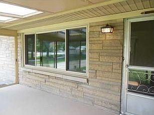 Porch. Another view of the porch  All the windows in this house are newer vinyl replacement windows.
