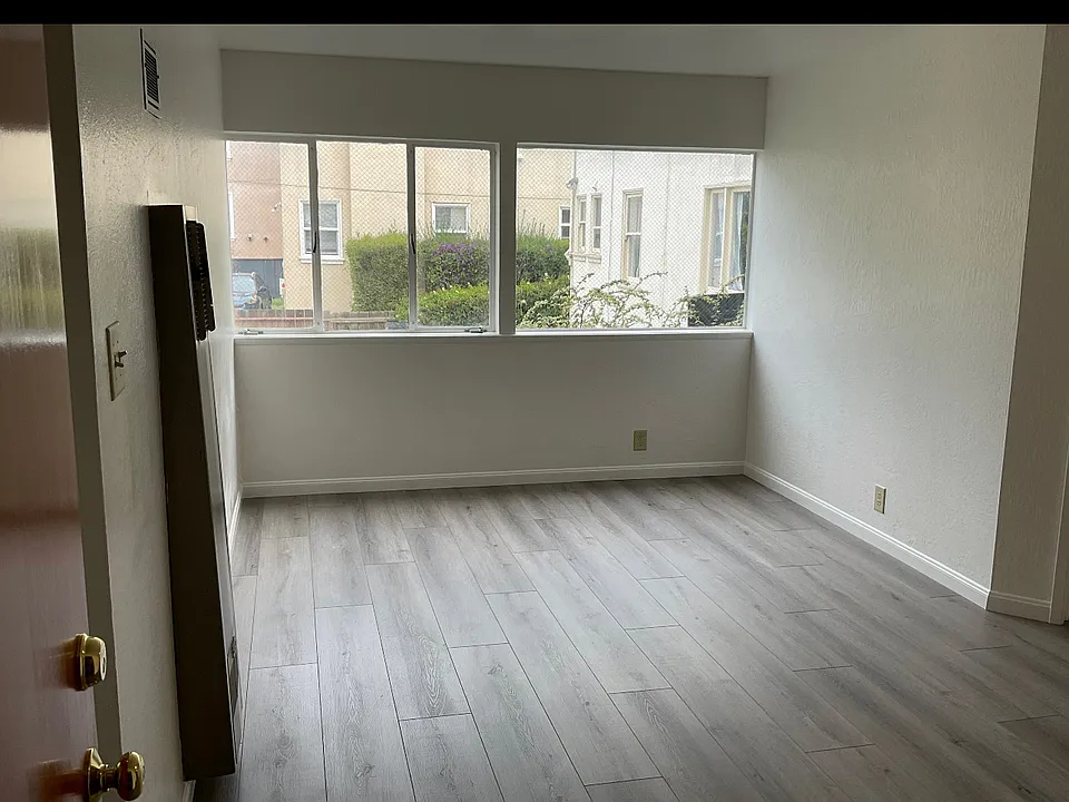 Unit #105 New Living Room - View 1