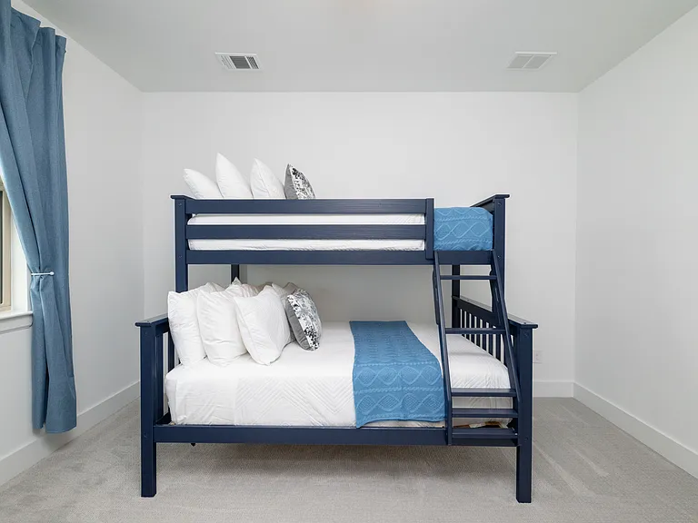 Bedroom #3 has a bunk bed w/ the bottom as a full size bed & top is a twin bed