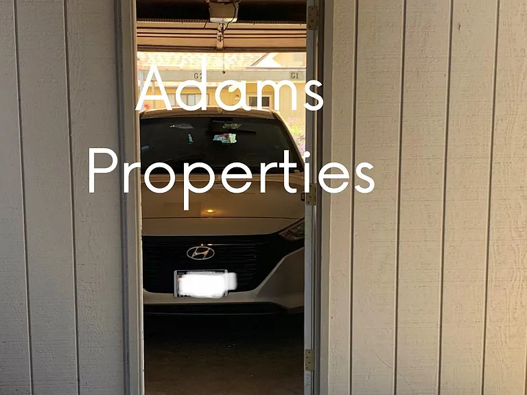 single car garage w covered walk way to condo