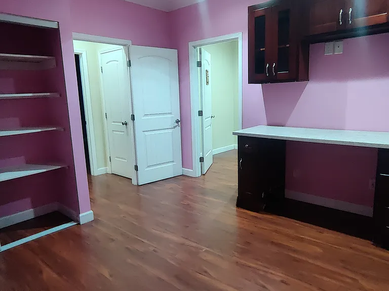 bedroom with built in study desk