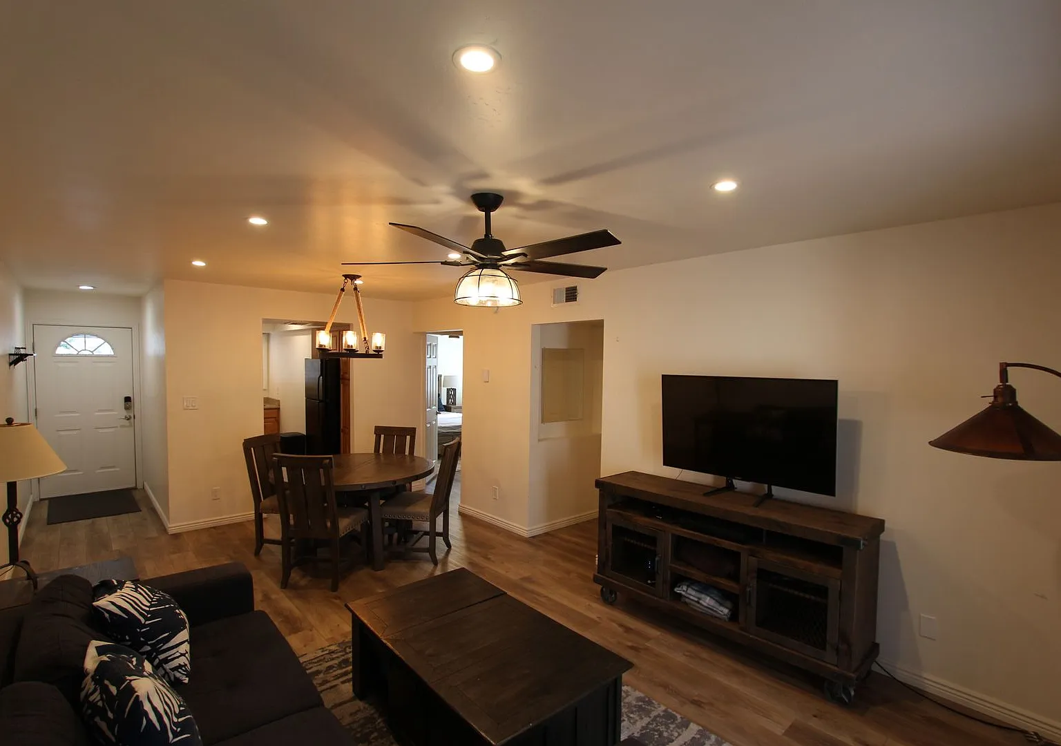 Price Improvement & $300 Move-In Special | Furnished Ground-Floor Condo with Small Fenced Yard — Photo 1