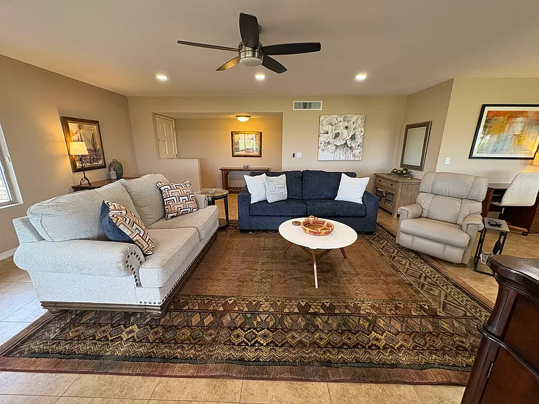 Living room with queen sofa/sleeper, loveseat and recliner