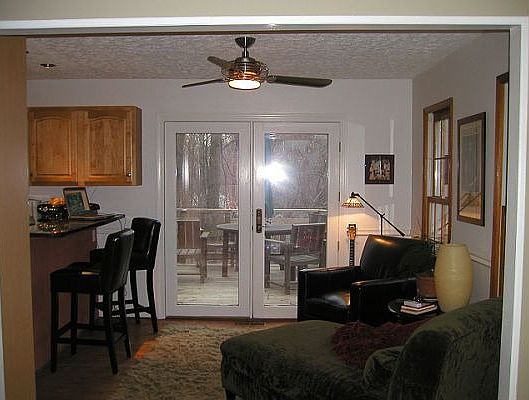 Kitchen bar and lounge nook, french doors to deck