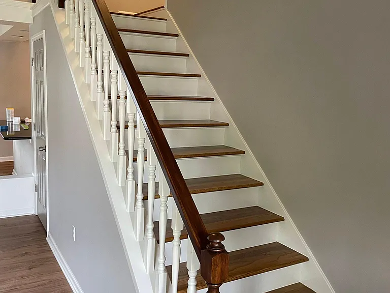 Hardwood stairs to bonus room