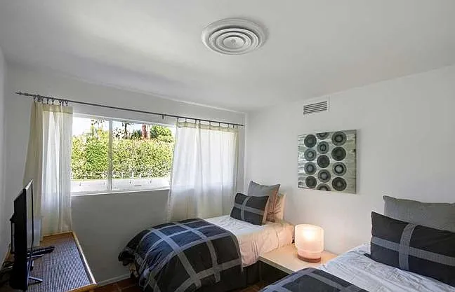 Twin Bedroom with Backyard View