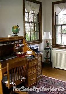 Den
						:
						Ideal office space; 6 windows floods room with natural light; hardwood floor