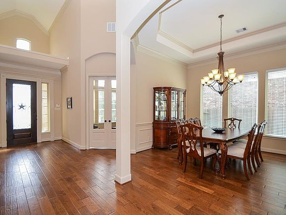 Gorgeous hardwood flooring starts at the warm entry and extends throughout the first floor.