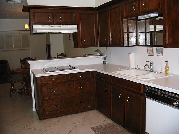 The convenient kichen has a gas range.