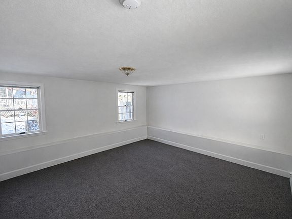 Large private bedroom with neutral finishes