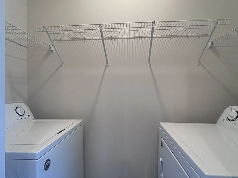 Laundry room includes washer & dryer