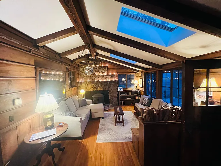 The open floor plan allows for connection from kitchen to dining to salon