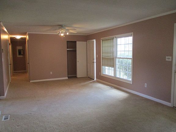 2nd view of Living/Main room, entry closet, hall with 2 smal