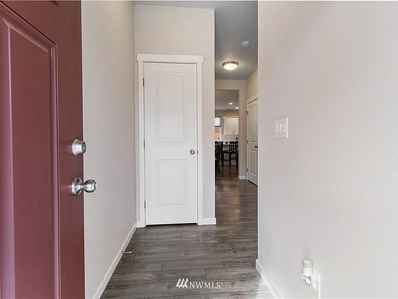 Expansive laminate hardwood flooring and plenty of storage are just a few of the highlights of this home