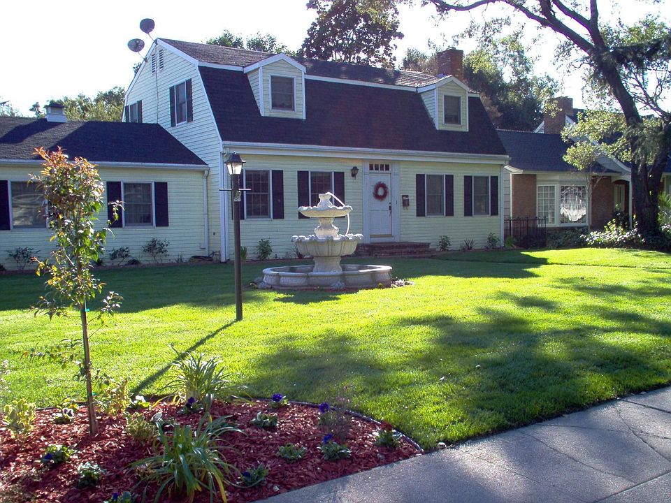re-landscaped front yard w/new fountain