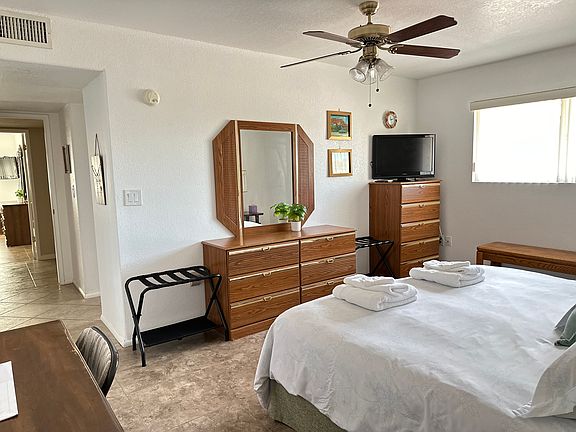 Master Bedroom with TV, plenty of drawers & 2nd private Desk