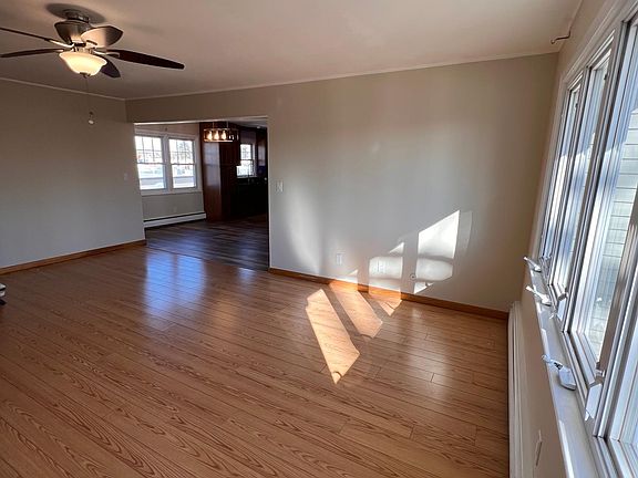 Large living room with large windows for sunlight