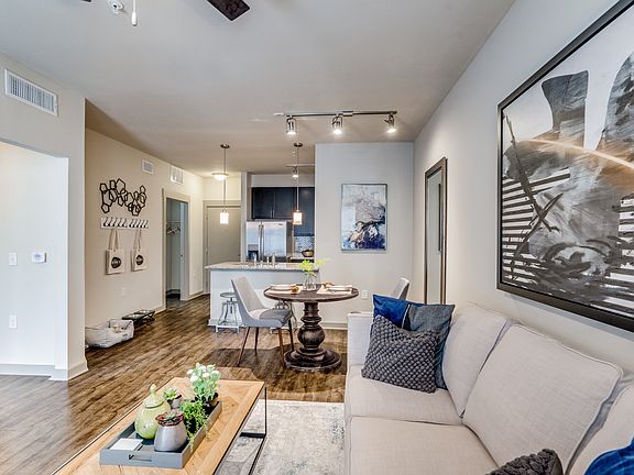 modern living room with wood plank flooring